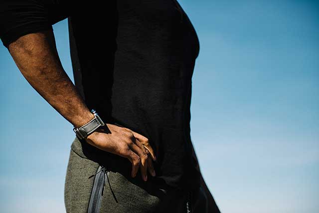 A man wearing an Apple Watch Series 2.